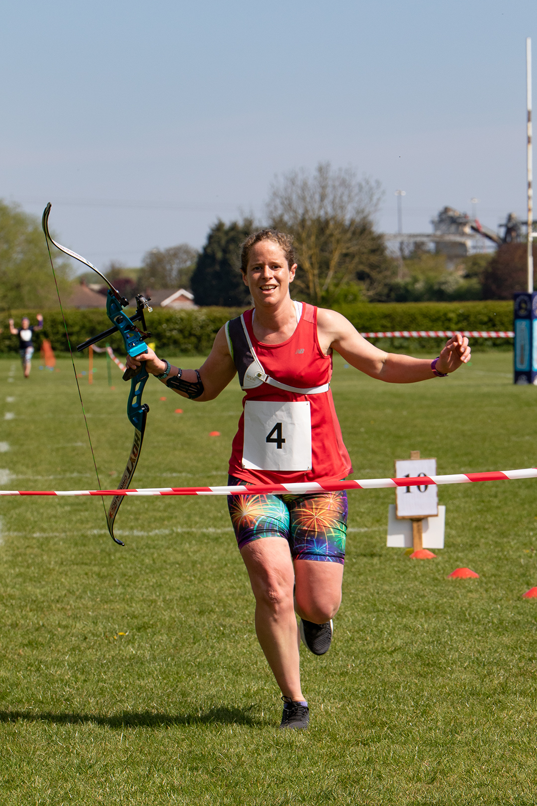 Woman running with bow